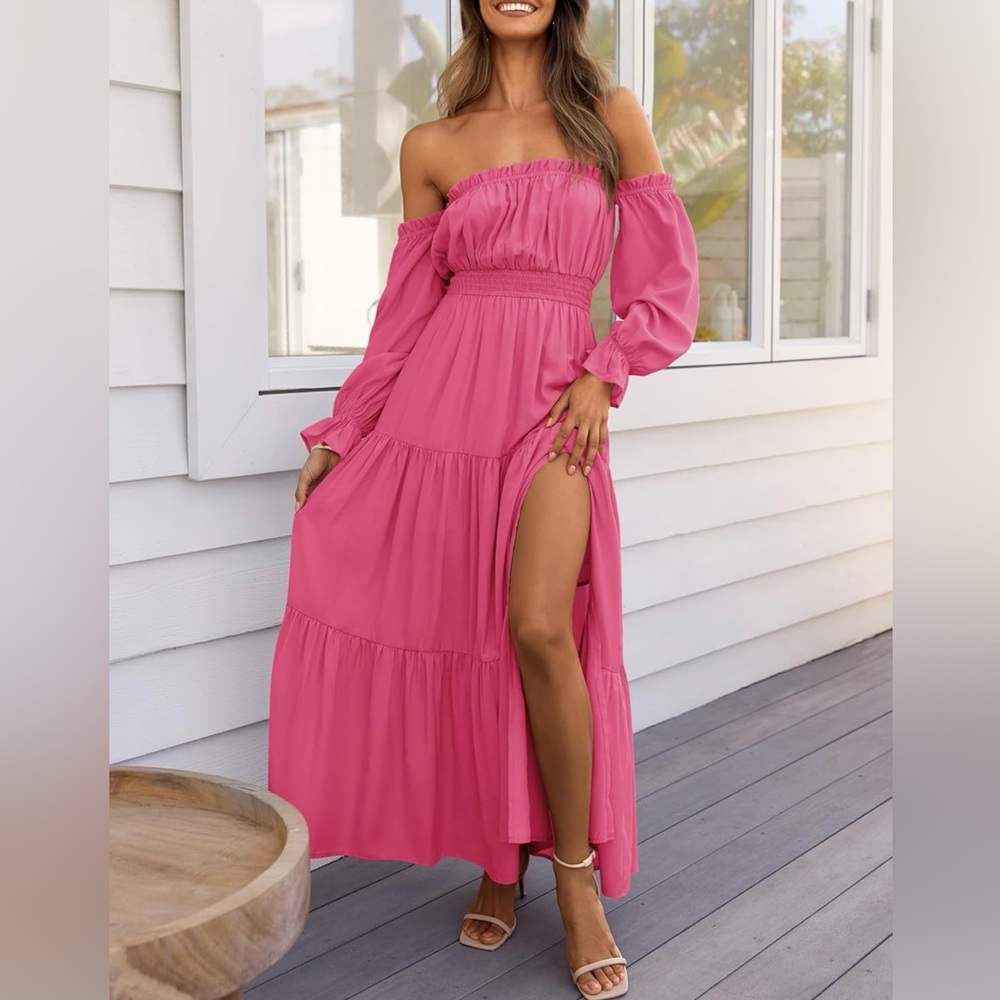 Pink off shoulder making dress with slit.